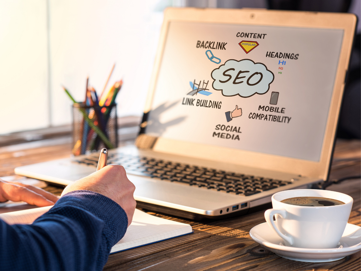 Person working on a laptop displaying SEO strategy elements like backlinks, headings, and content structure, illustrating law firm content optimization for AI citability, structured data, and generative engine search performance.