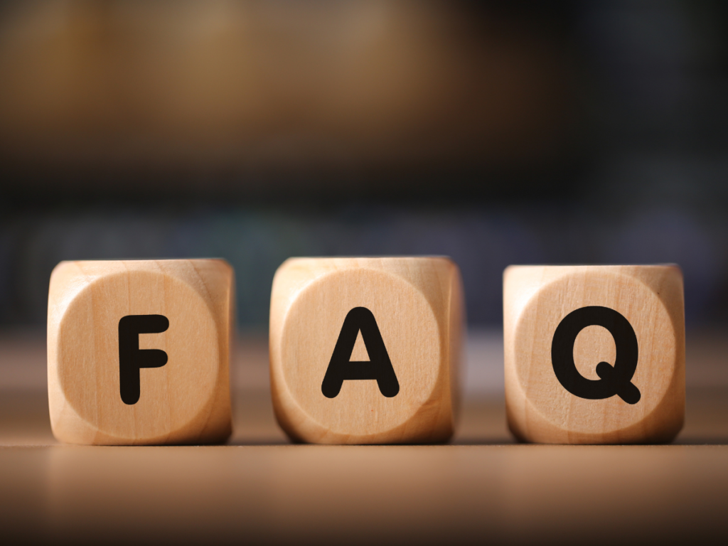 FAQ spelled out on wooden blocks. 