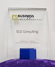 Acquisition International Business Excellence Award plaque