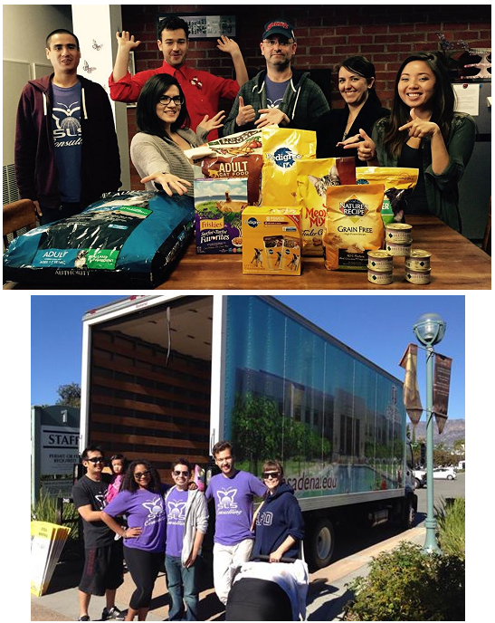 SLS staff with food donations on table and in front of donaion truck